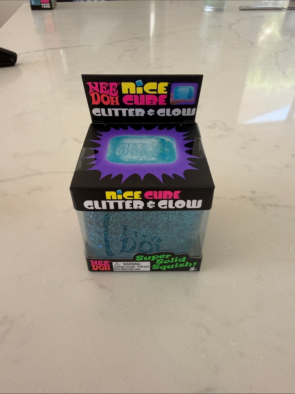 NEW unopened box NeeDoh Nice Cube Glitter & Glow Blue Squishy Toy